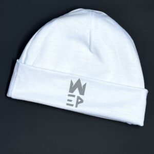 white colored baby hat with EI Patron world logo