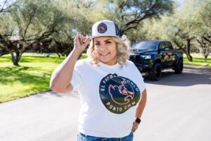 Image of girl wearing el patron word T-shirt